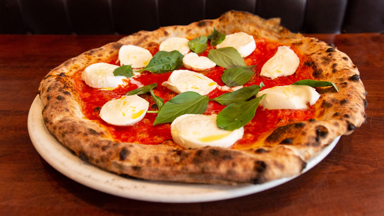 Wood-fired margherita pizza with buffalo mozzarella at Sartori