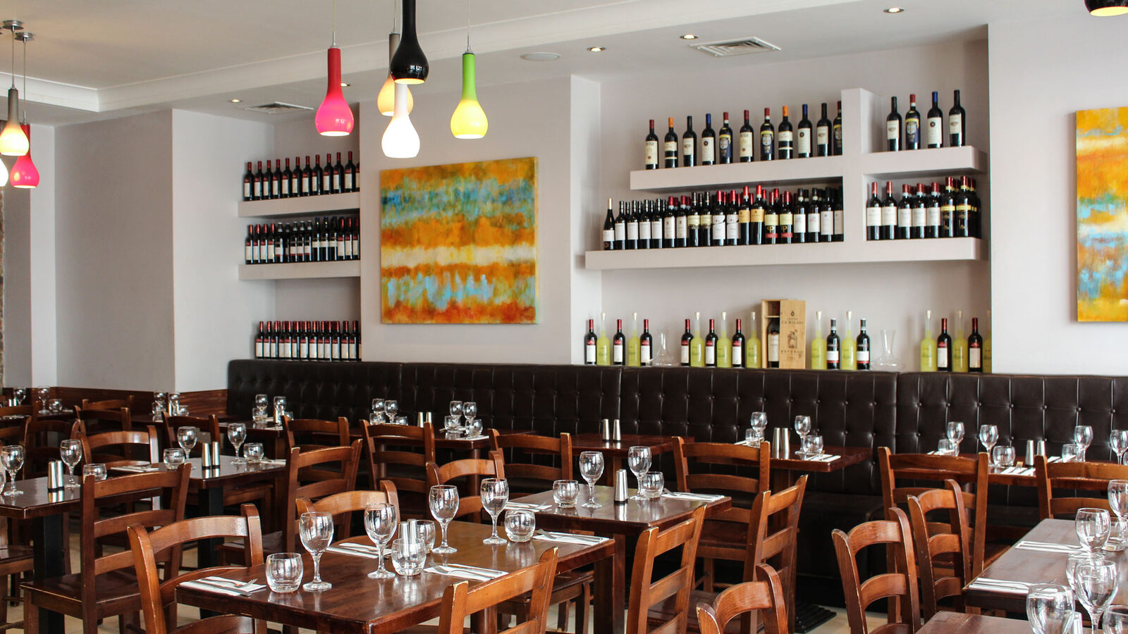 A long table set for a group at Sartori