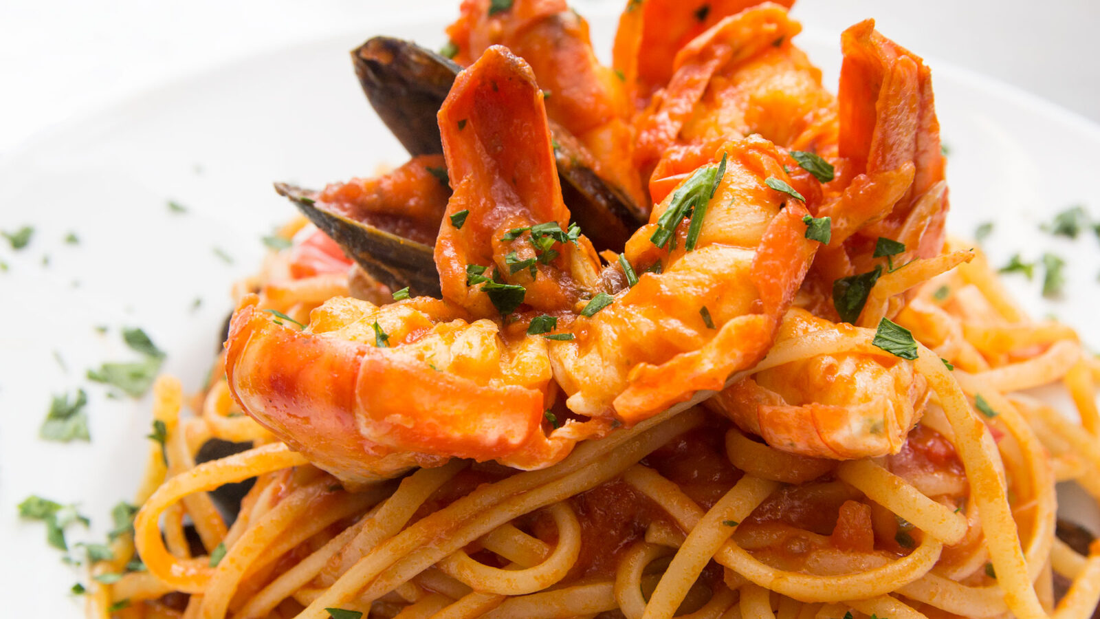 Linguine with king prawns, mussels and cherry tomatoes