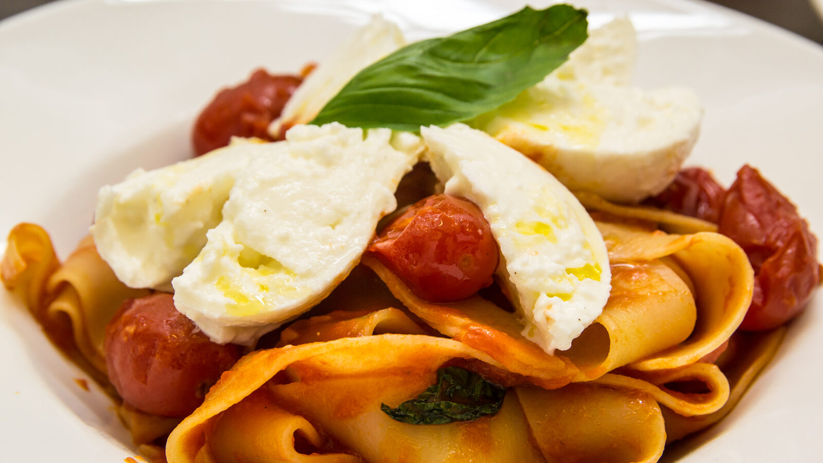 Tagliatelle with burrata and cherry tomatoes